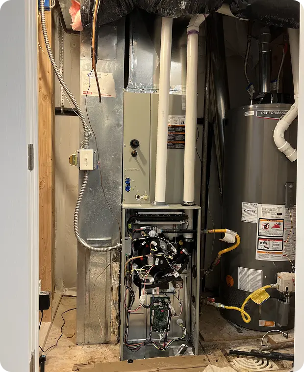 Heating system with oven and water heater with pipes